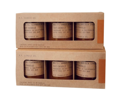 Straight-on view of kraft candle boxes with inserts containing three soy candles, made with folding cartons packaging ideal for gifting and stores.