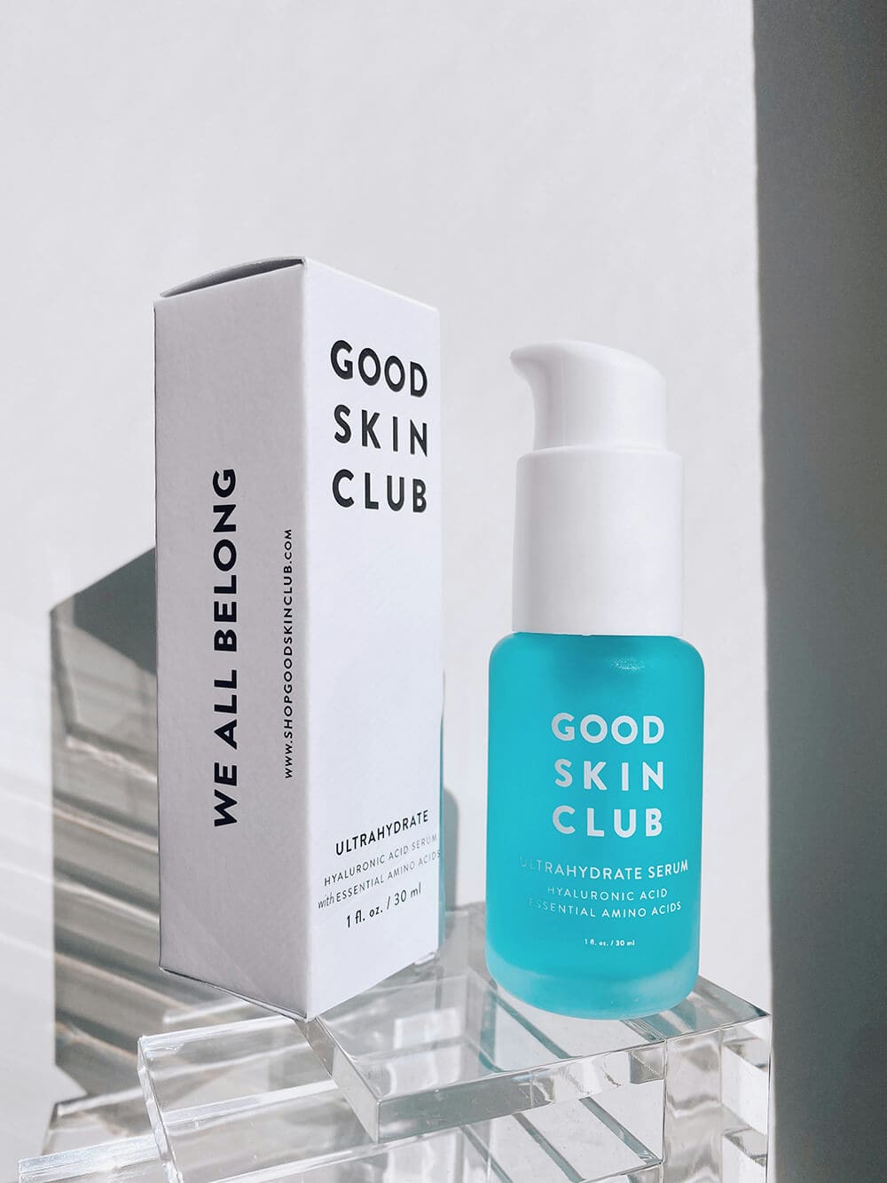 Minimalist serum packaging with sleek, clear design.