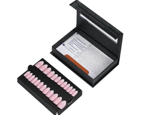 Elegant black magnetic nail box with custom-cut window and organized compartments for press-on nails.