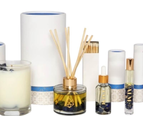 Complete reed diffuser packaging wholesale set with matching supplies including candles and droppers.