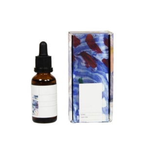 Colorful printed serum boxes with flip top design and matching glass serum bottle – premium serum boxes for cosmetic products.