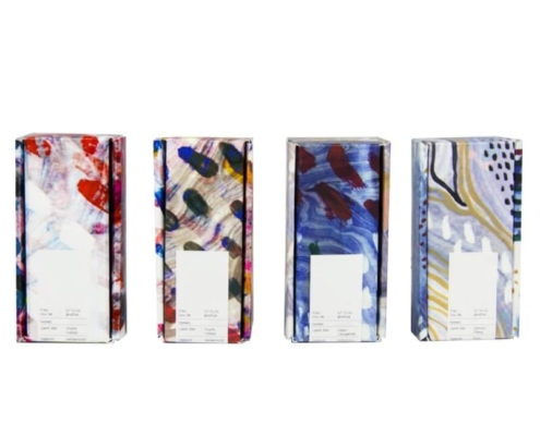 Front view of four serum boxes with different printed designs – eye-catching printed serum boxes for retail display.