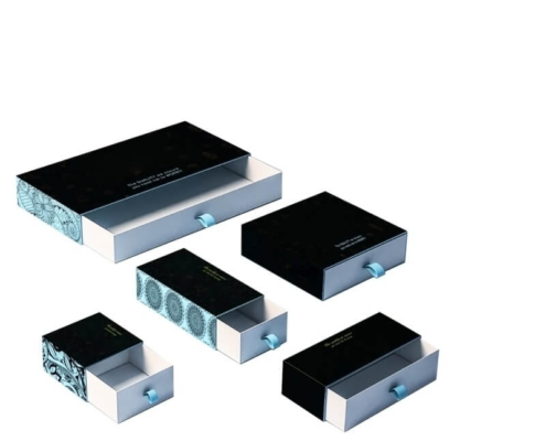 Assorted sizes of sliding drawer boxes with custom ribbon pulls