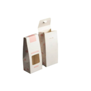 White gable boxes with tuck top and snap lock bottom for secure packaging