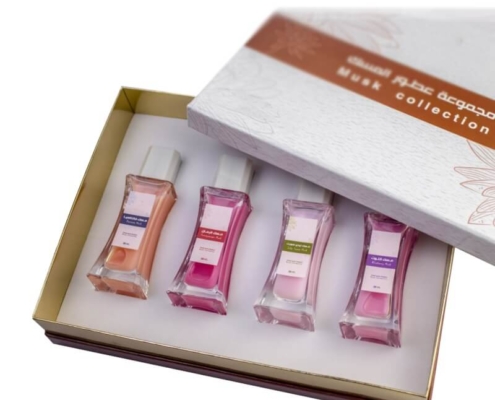 Wholesale perfume gift set box featuring 4 colorful perfume bottles in a premium rigid box