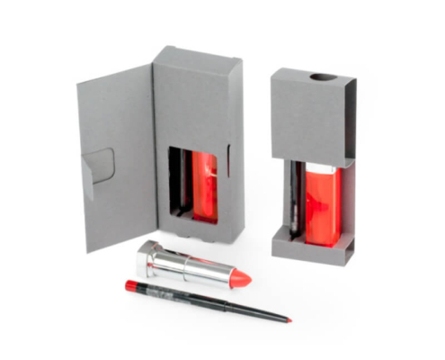 Interior of chapstick container packaging with custom insert for chapstick and lipstick products.