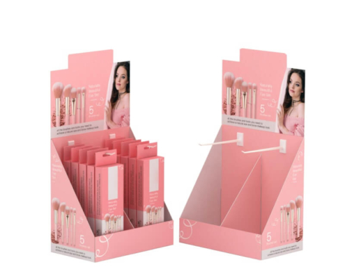 Empty pink cardboard counter display box for makeup brush packaging with custom insert and product hanger slots